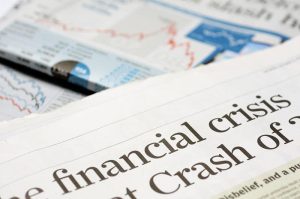 Newspaper showing financial crisis headline